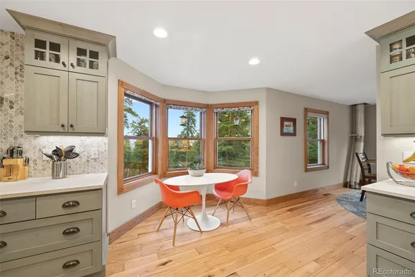 a workspace with furniture and window