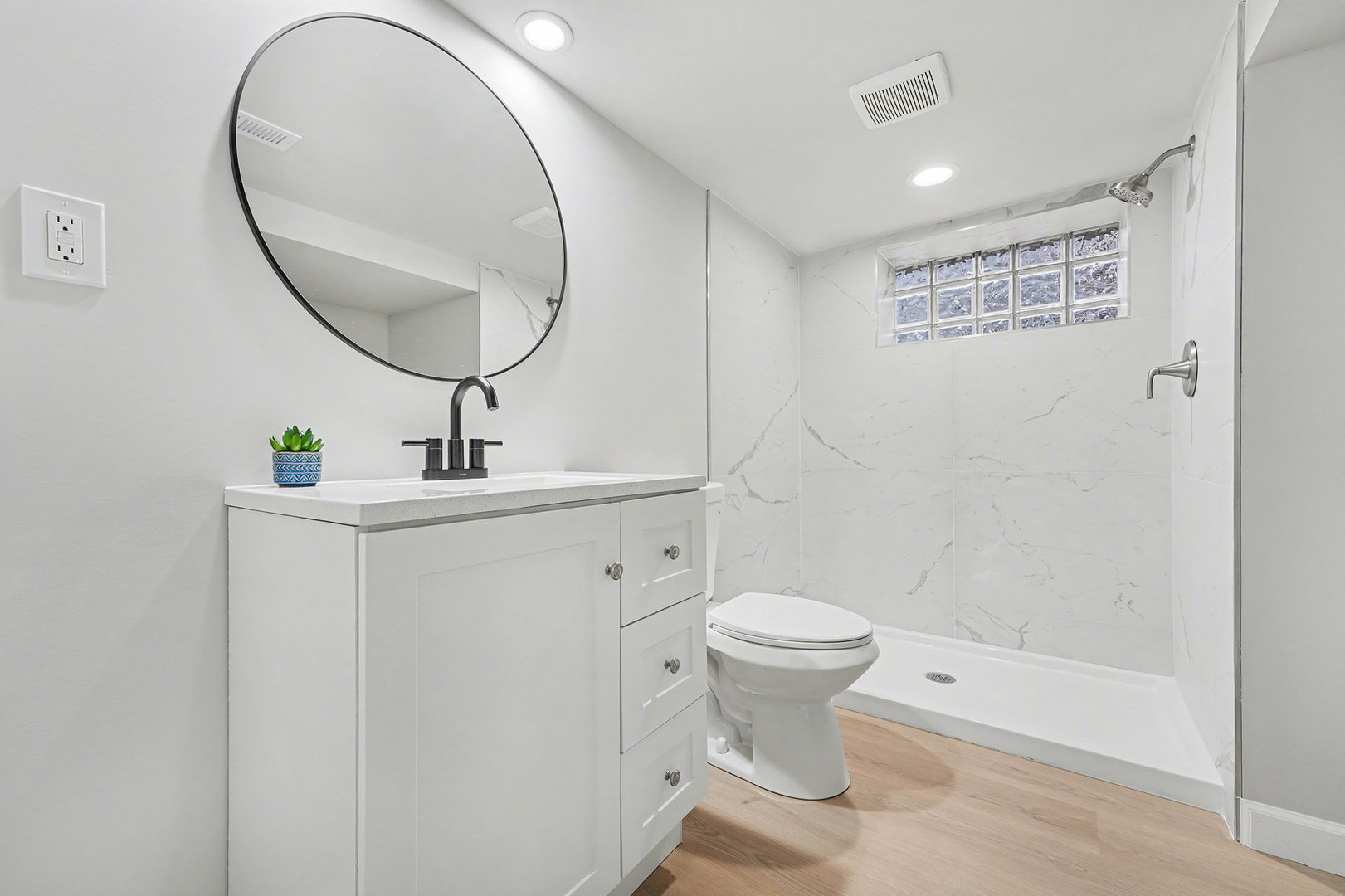 3634 178th Street Lansing, IL 60438 - Photo 22 of 28 a bathroom with a sink toilet and shower