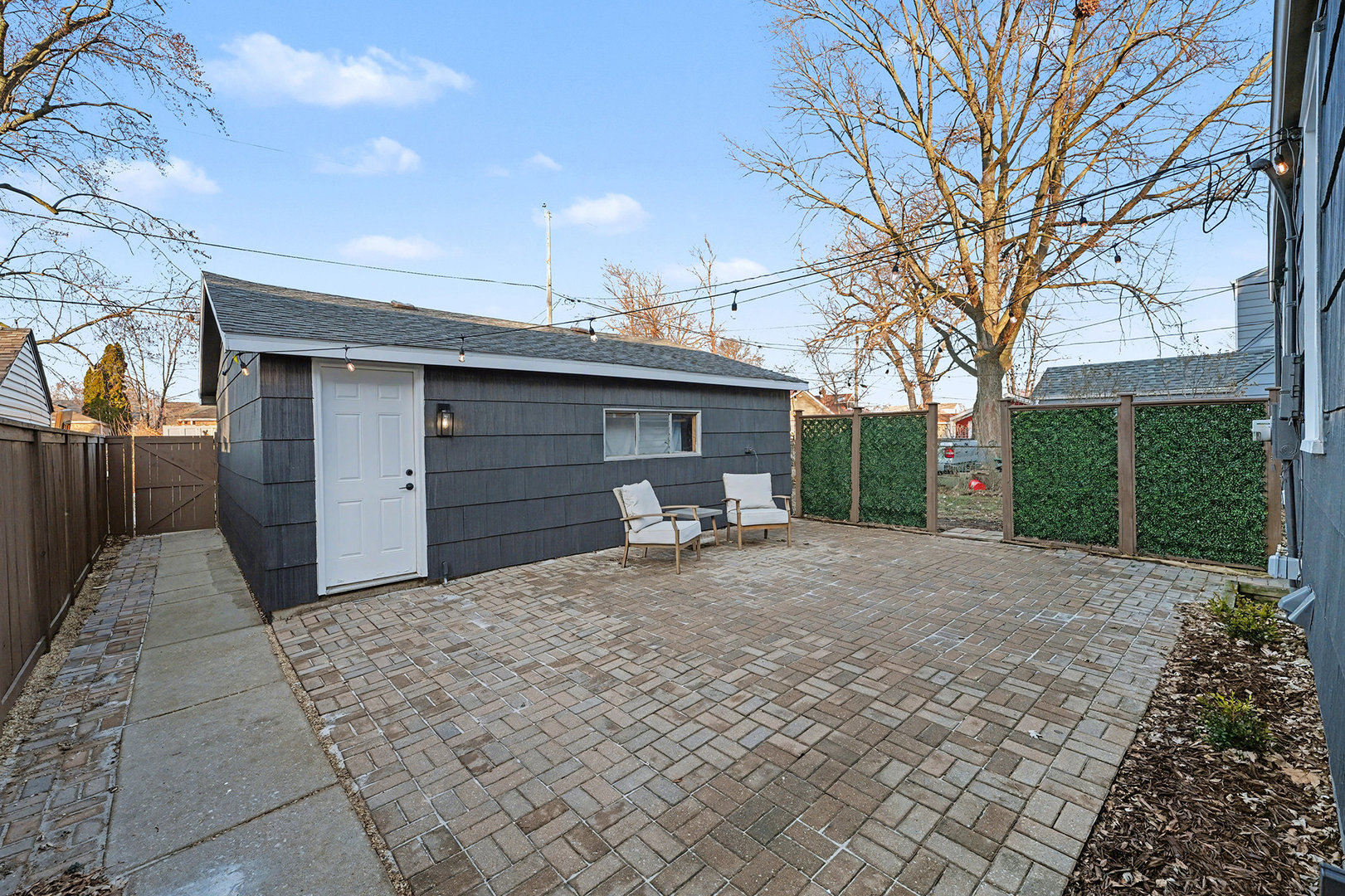 3634 178th Street Lansing, IL 60438 - Photo 24 of 28 a front view of a house with a yard and garage