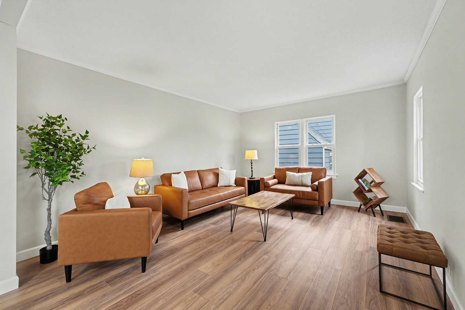 3634 178th Street Lansing, IL 60438 - Photo 4 of 28 a living room with furniture and a window