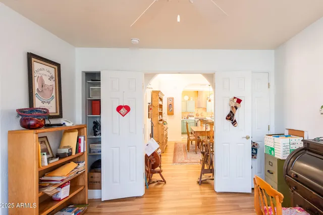 a living room with furniture and a window