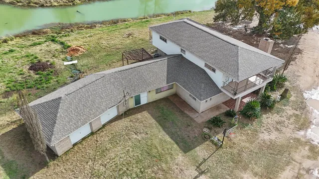 a view of a house with a ocean view