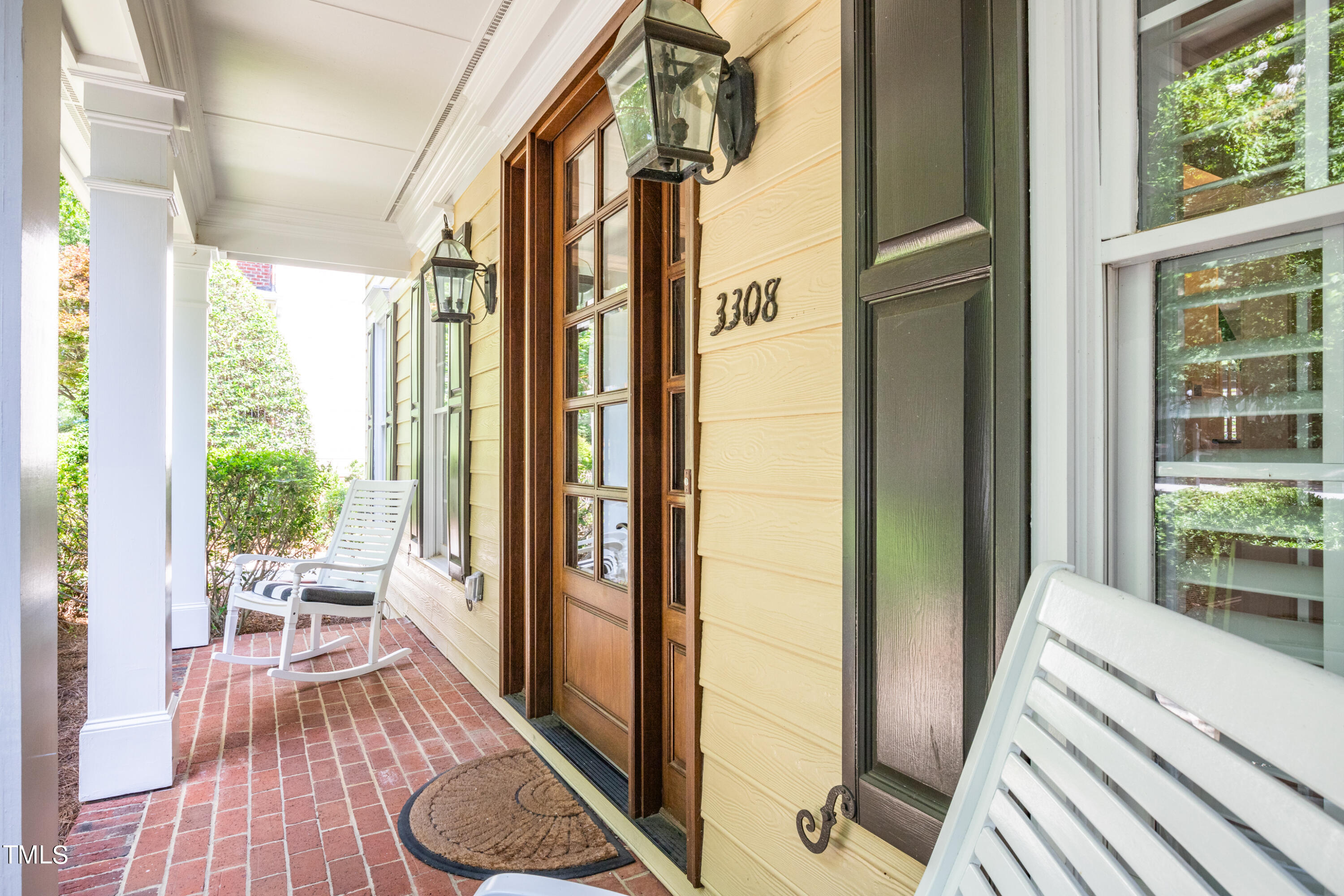 3308 Tall Tree Place Raleigh, NC 27607 - Photo 3 of 34 a view of a balcony with wooden floor and furniture