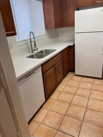 a room with a black white checkered floor