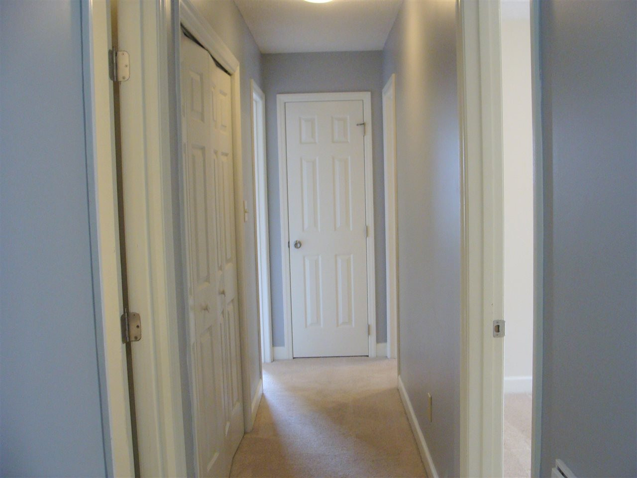 4136 Mardella Drive Raleigh, NC 27613 - Photo 10 of 30 Downstairs hall to bedrooms
