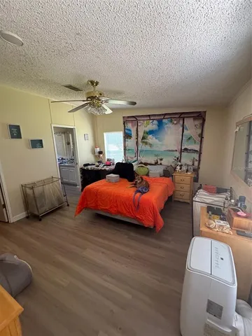 a bed room with a bed and a couch