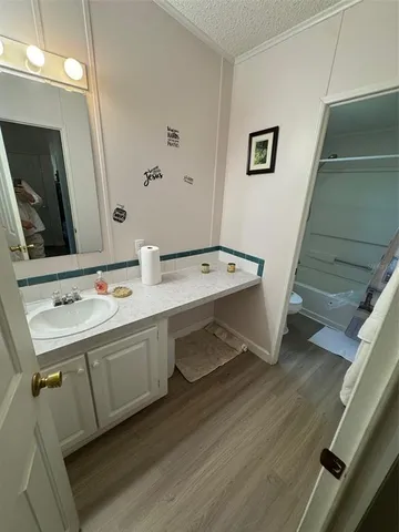 a bathroom with a double vanity sink and mirror