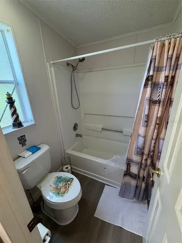 a bathroom with a sink a bathtub and a shower