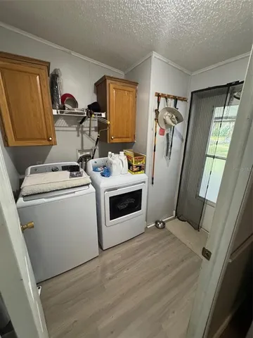 a view of kitchen and sink