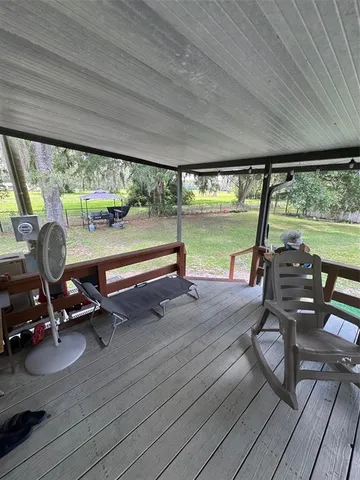 a view of a swimming pool and outdoor space