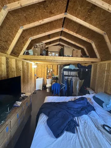 a bathroom with a toilet a sink and a mirror