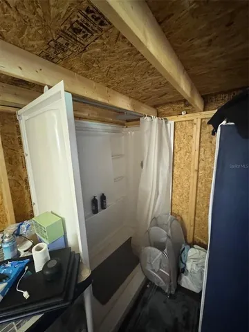 a room with furniture and windows