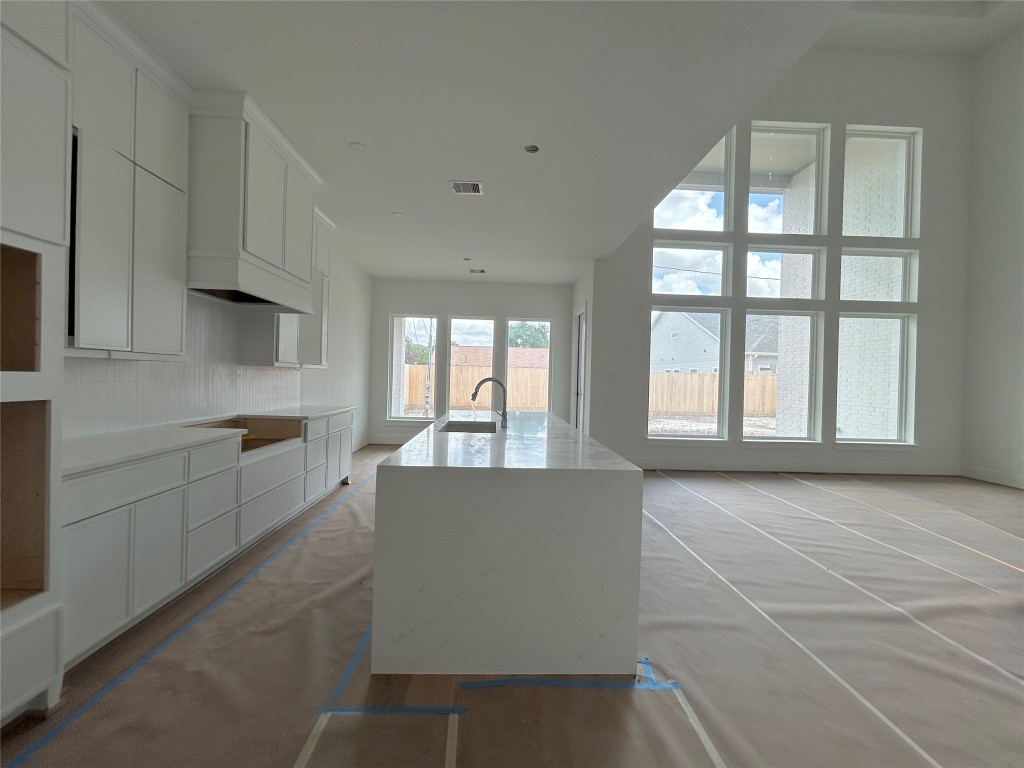 1918 Ridgecrest Drive Houston, TX 77055 - Photo 7 of 27 Open Concept Living Space That Flows From the Kitchen, Living Area, and Formal Dining. Construction Photo as of 4/16/2026
