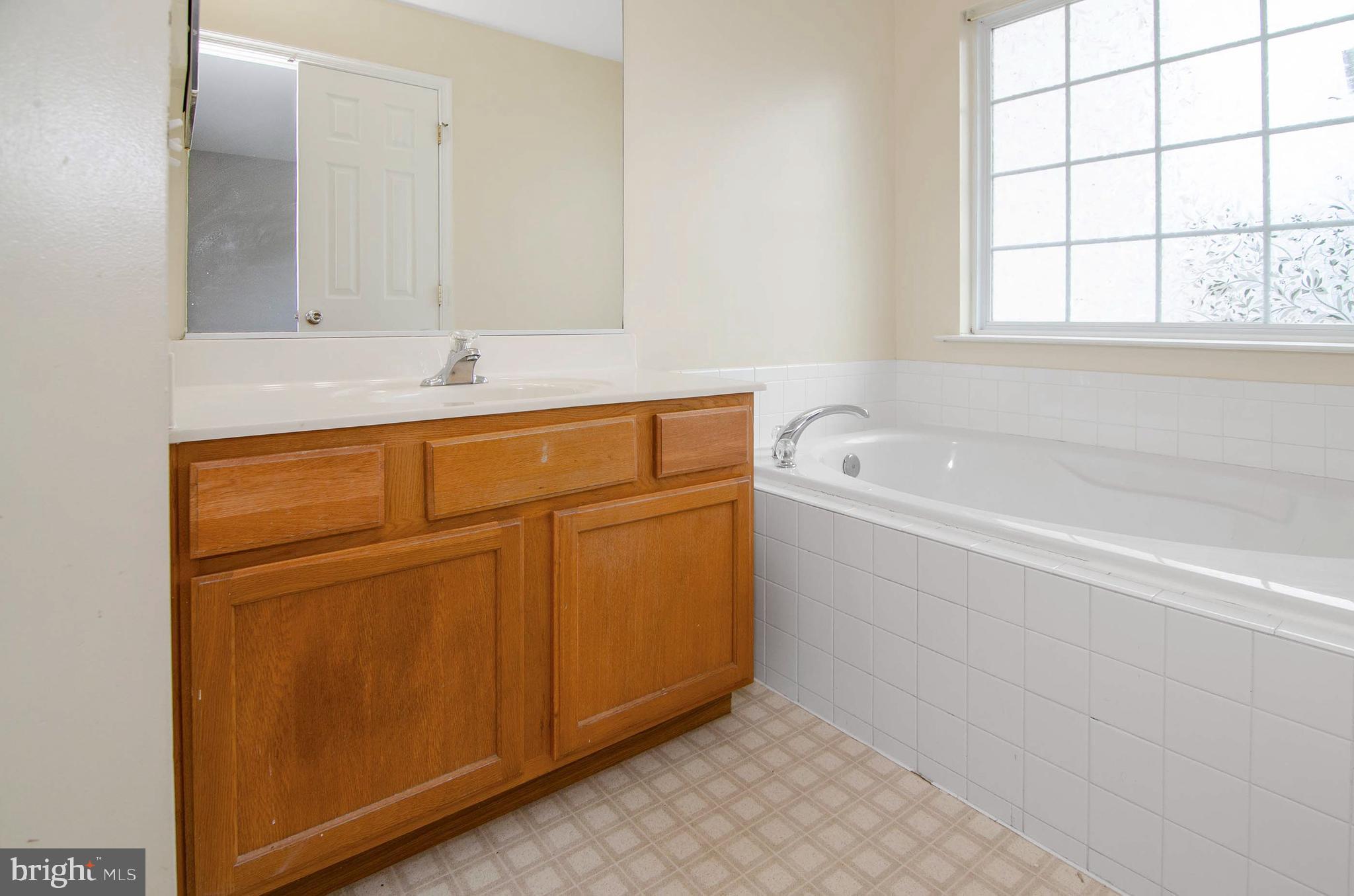 1721 Waltman Road Edgewood, MD 21040 - Photo 17 of 28 main bedroom en suite with large tub and shower