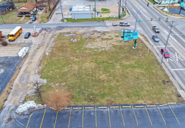 a view of swimming pool with outdoor seating