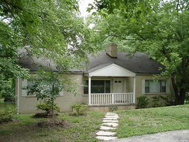 1473 Fairview Road Northeast, Unit 3 Atlanta, GA 30306 - Photo 1 of 1 a view of a house with a small yard