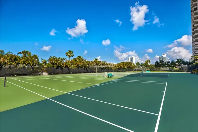 a group of cars parked in a parking lot