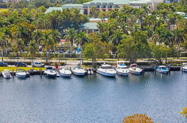 a view of a swimming pool in front of the house