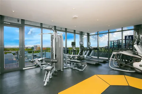 a view of a room with gym equipment