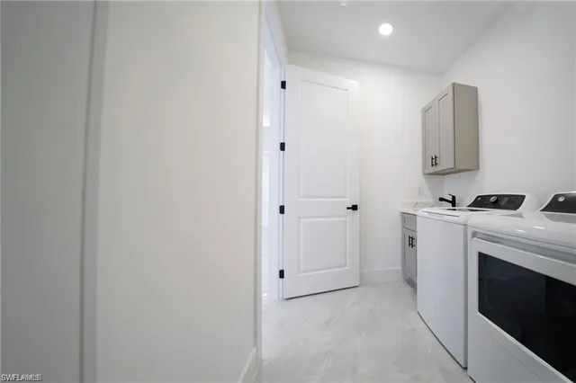 a view of an empty room with windows