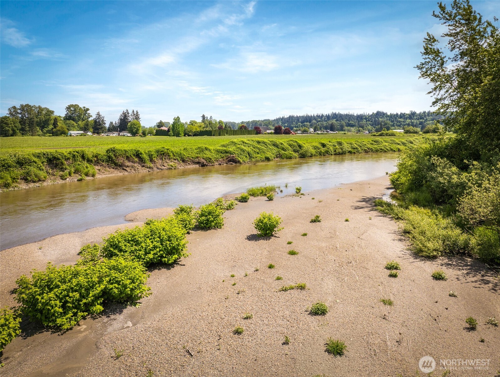2304 Norman Road Stanwood, WA 98292 - Photo 30 of 39 a view of a lake with beach and city view