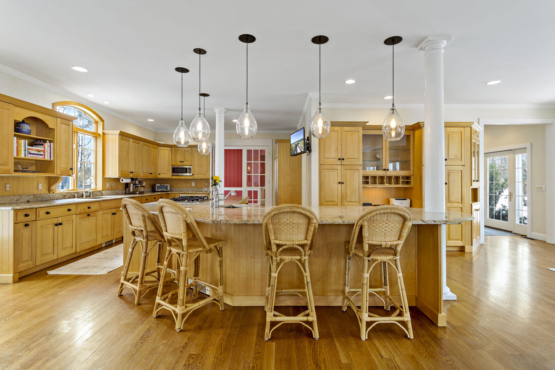 442 Bay Lane Centerville, MA 02632 - Photo 13 of 36 a view of a kitchen with a table and chairs