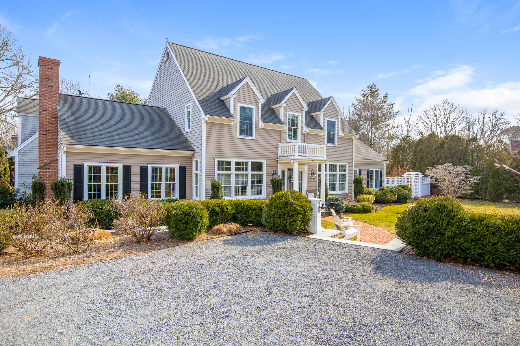 442 Bay Lane Centerville, MA 02632 - Photo 2 of 36 a view of a front of a house with a yard