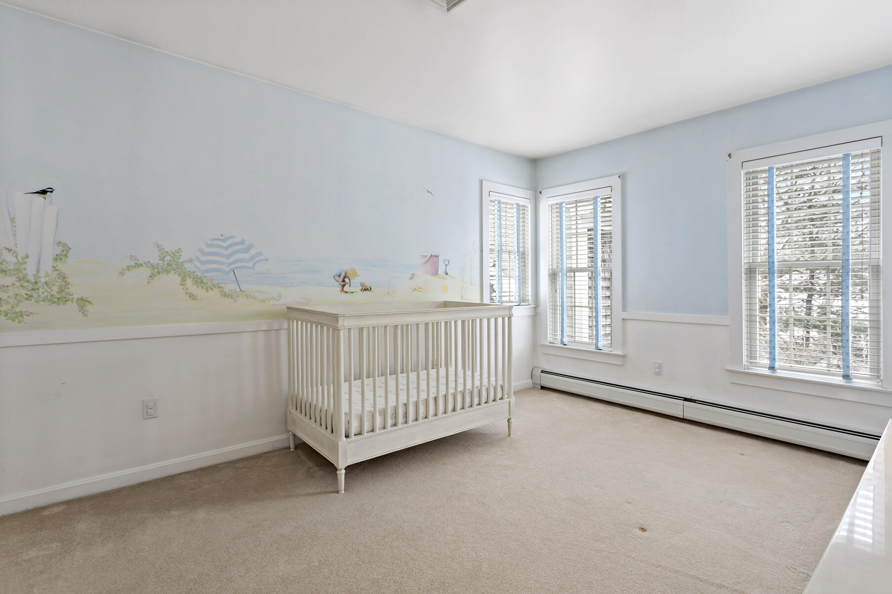 442 Bay Lane Centerville, MA 02632 - Photo 26 of 36 a room with a baby bed a couch and dresser