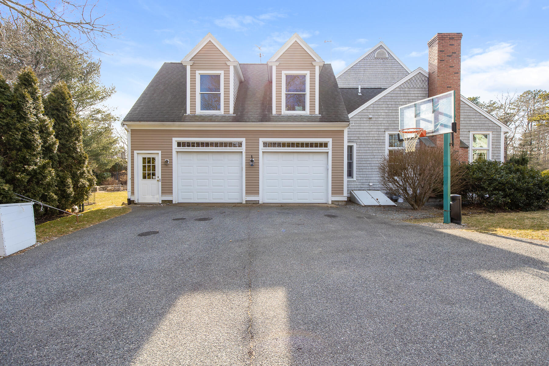 442 Bay Lane Centerville, MA 02632 - Photo 3 of 36 a view of a house with a street