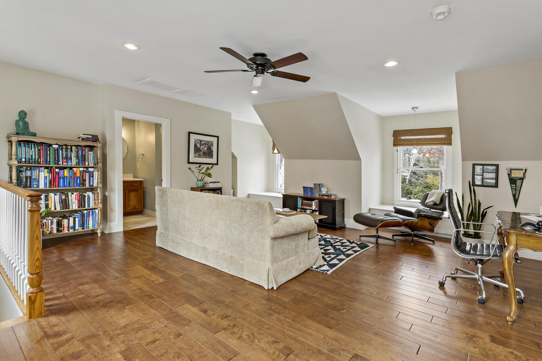 442 Bay Lane Centerville, MA 02632 - Photo 31 of 36 a living room with furniture and a book shelf