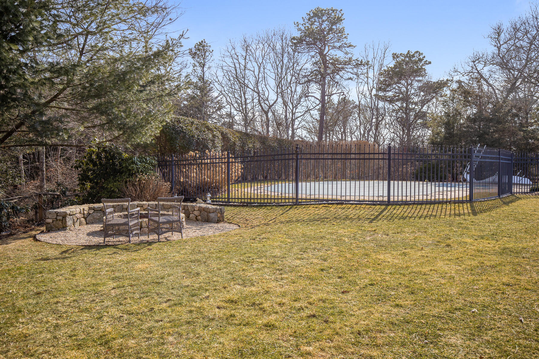 442 Bay Lane Centerville, MA 02632 - Photo 4 of 36 a view of a backyard with swimming pool