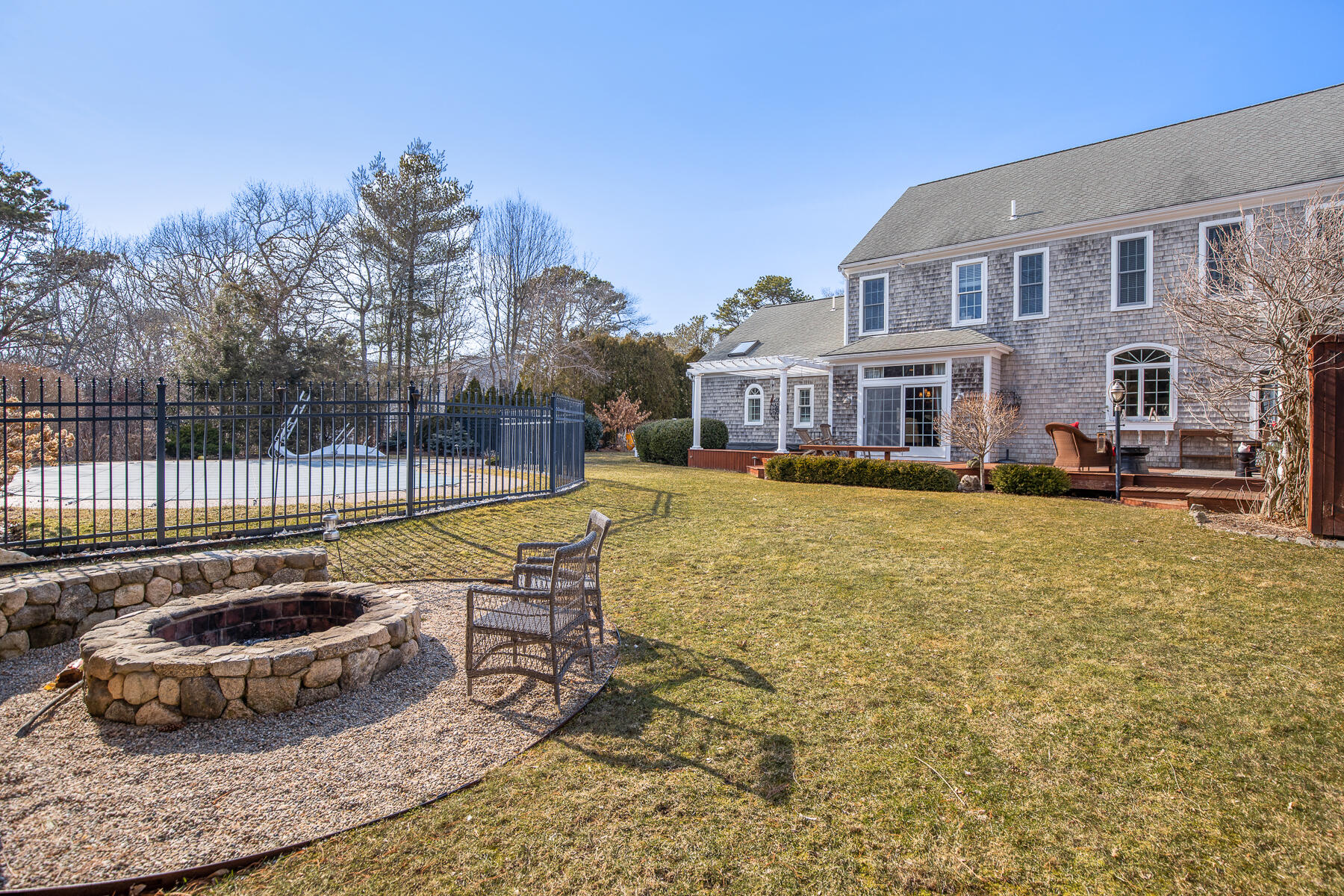 442 Bay Lane Centerville, MA 02632 - Photo 5 of 36 a view of a house with backyard and sitting area