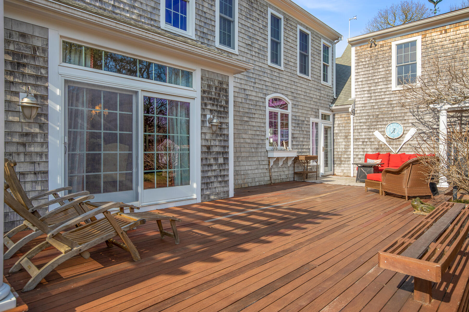 442 Bay Lane Centerville, MA 02632 - Photo 6 of 36 a front view of a house with a yard
