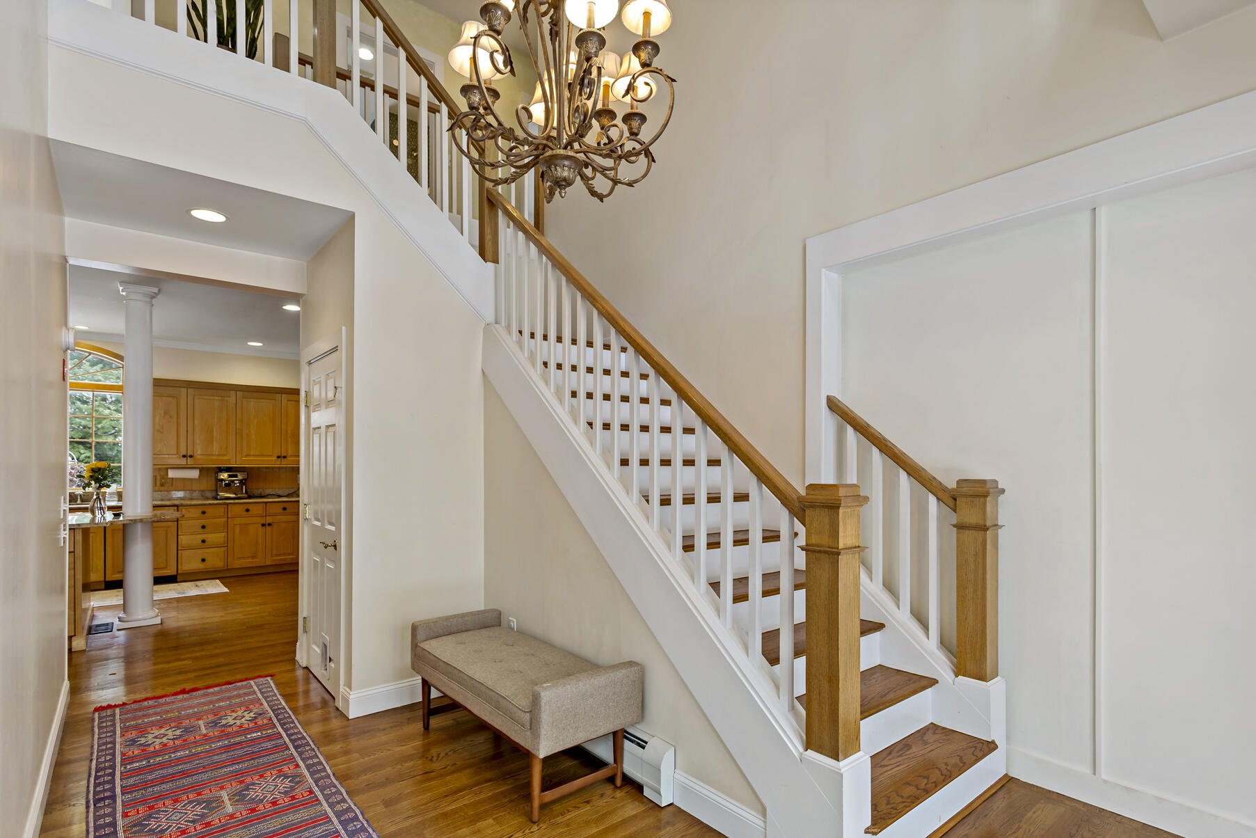 442 Bay Lane Centerville, MA 02632 - Photo 7 of 36 a view of entryway and hall with wooden floor