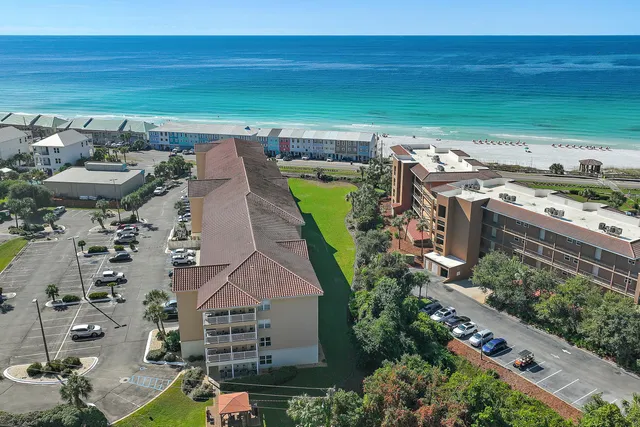an aerial view of a house with outdoor space