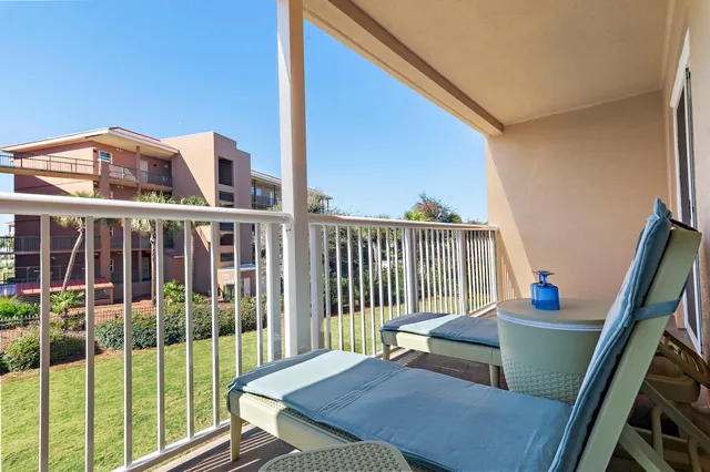 a view of balcony with furniture