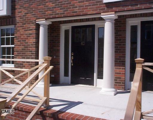 63 Sherman Street Fairfield, CT 06824 - Photo 1 of 1 a view of a house with a barbeque and wooden stairs
