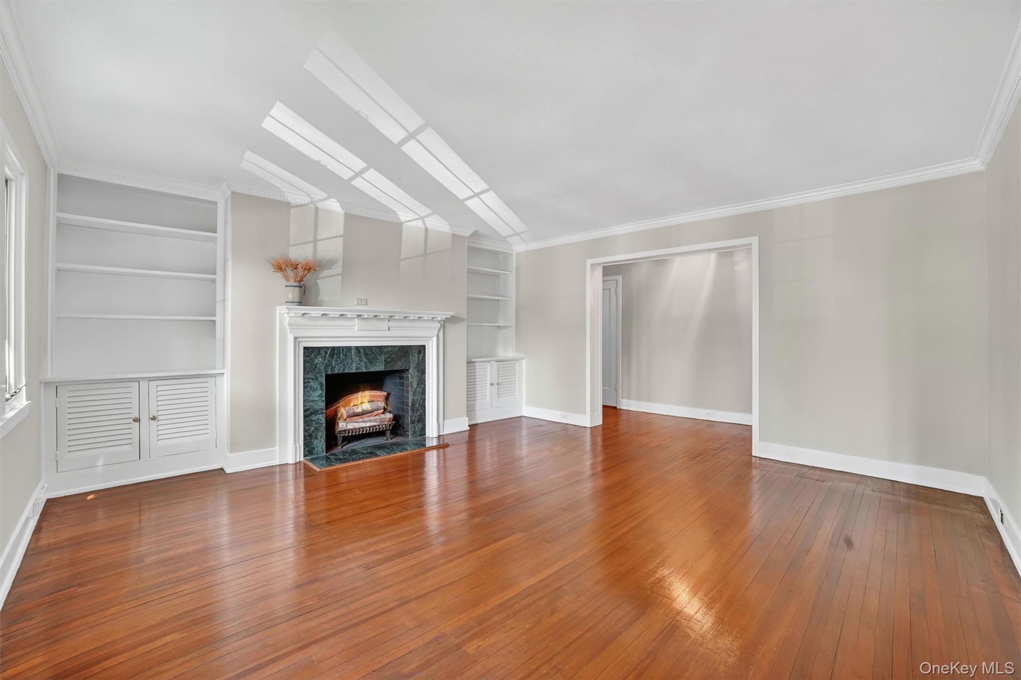 15 Beechtree Lane, Unit 1D Bronxville, NY 10708 - Photo 12 of 41 Living Room with wood burning fireplace