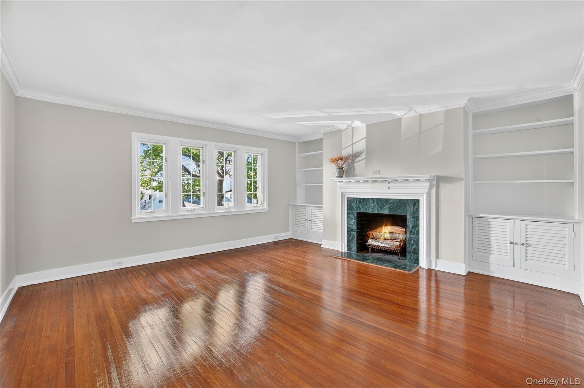 15 Beechtree Lane, Unit 1D Bronxville, NY 10708 - Photo 10 of 41 Living Room with wood burning fireplace