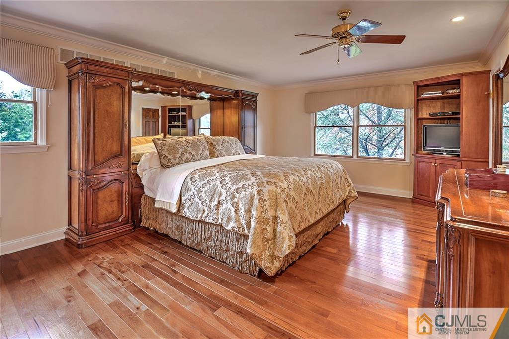 23 Winterberry Circle Piscataway, NJ 08854 - Photo 14 of 29 a bed sitting in a spacious bedroom next to a window