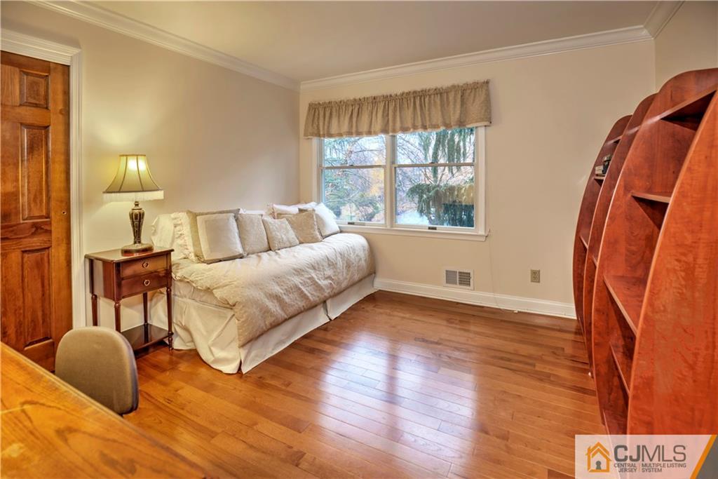 23 Winterberry Circle Piscataway, NJ 08854 - Photo 17 of 29 a bedroom with a bed and a window