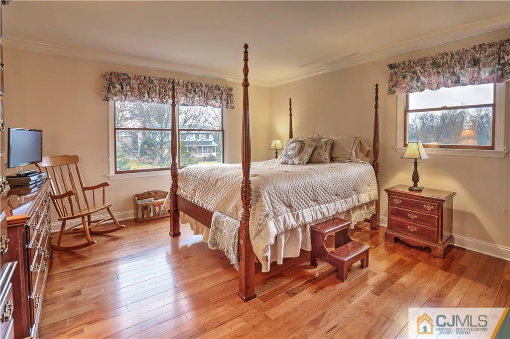 23 Winterberry Circle Piscataway, NJ 08854 - Photo 19 of 29 a bedroom with a bed window and a table