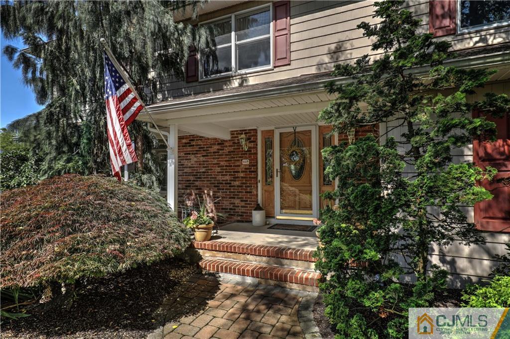23 Winterberry Circle Piscataway, NJ 08854 - Photo 3 of 29 a view of a house with a yard and tree s