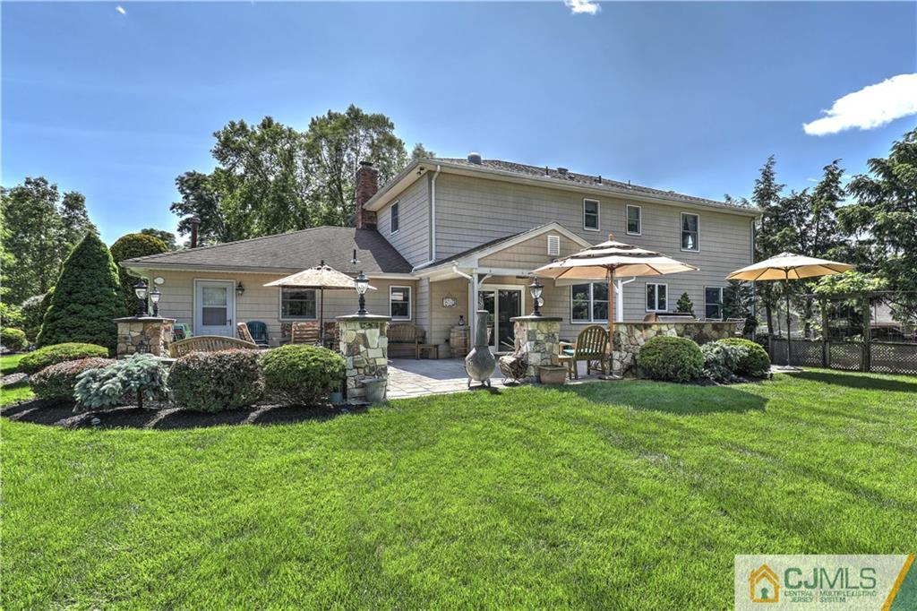 23 Winterberry Circle Piscataway, NJ 08854 - Photo 25 of 29 a front view of a house with garden and porch