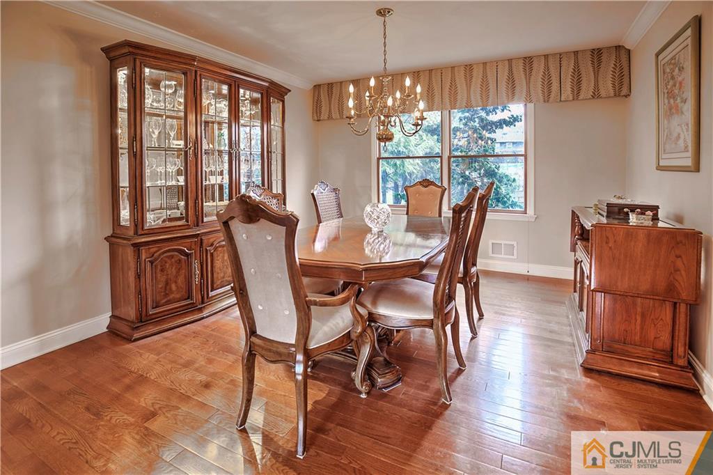 23 Winterberry Circle Piscataway, NJ 08854 - Photo 7 of 29 a view of a dining room with furniture window and wooden floor