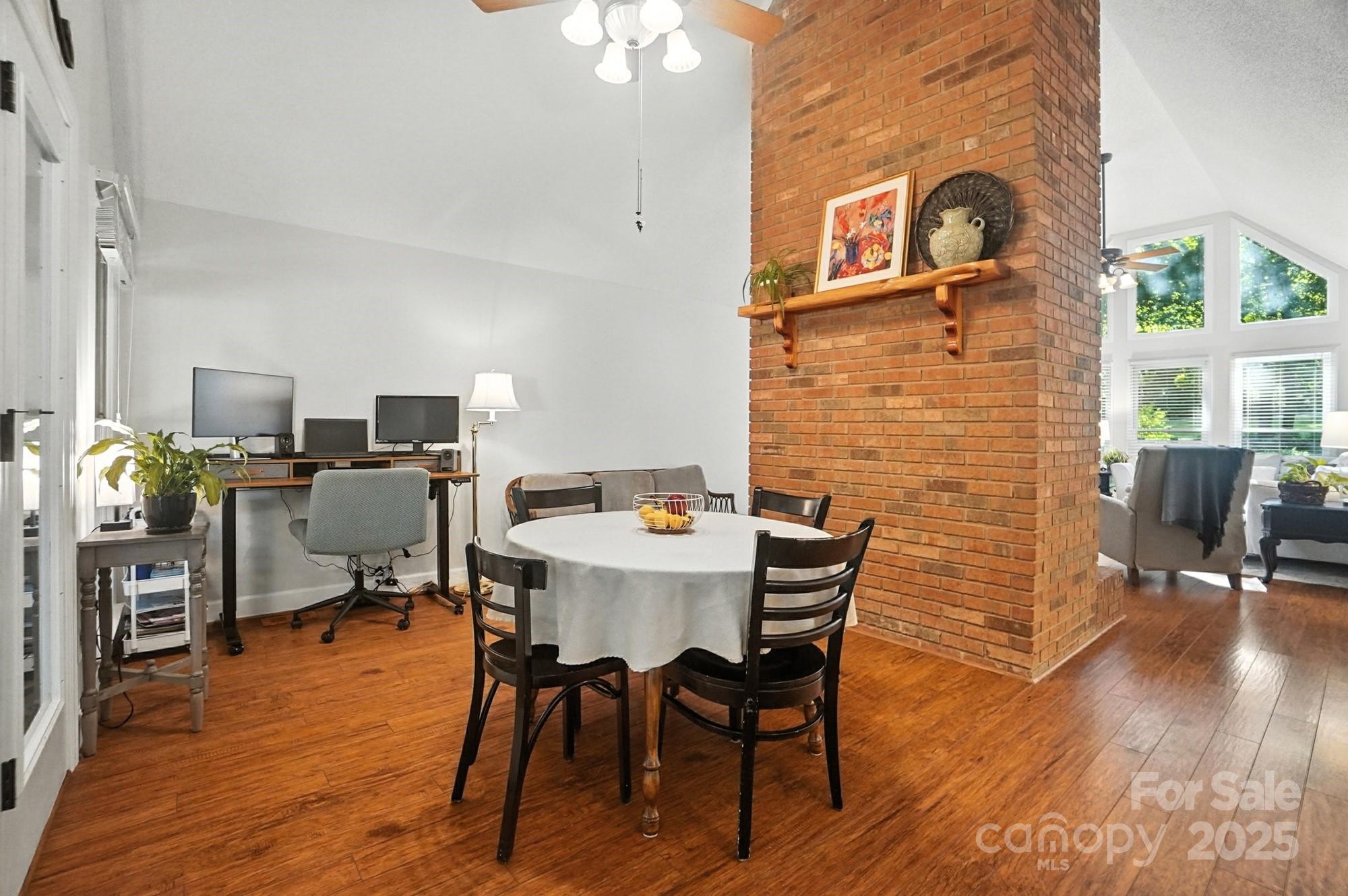 3618 Griffith Road Monroe, NC 28112 - Photo 13 of 48 a view of a dining room with furniture and wooden floor