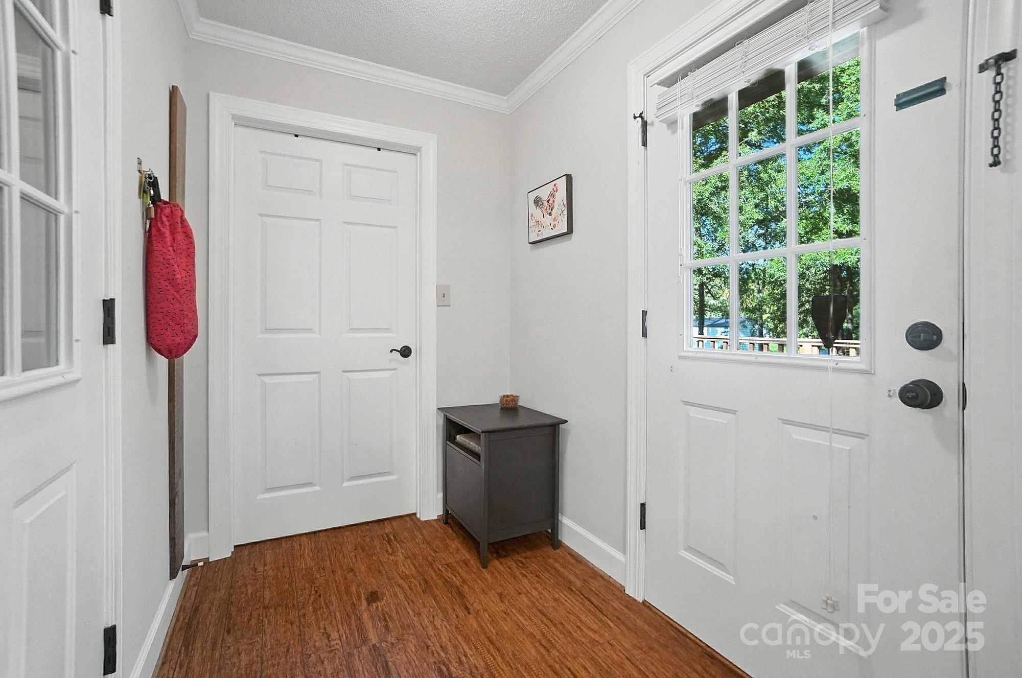 3618 Griffith Road Monroe, NC 28112 - Photo 21 of 48 a view of a room with wooden floor and a window