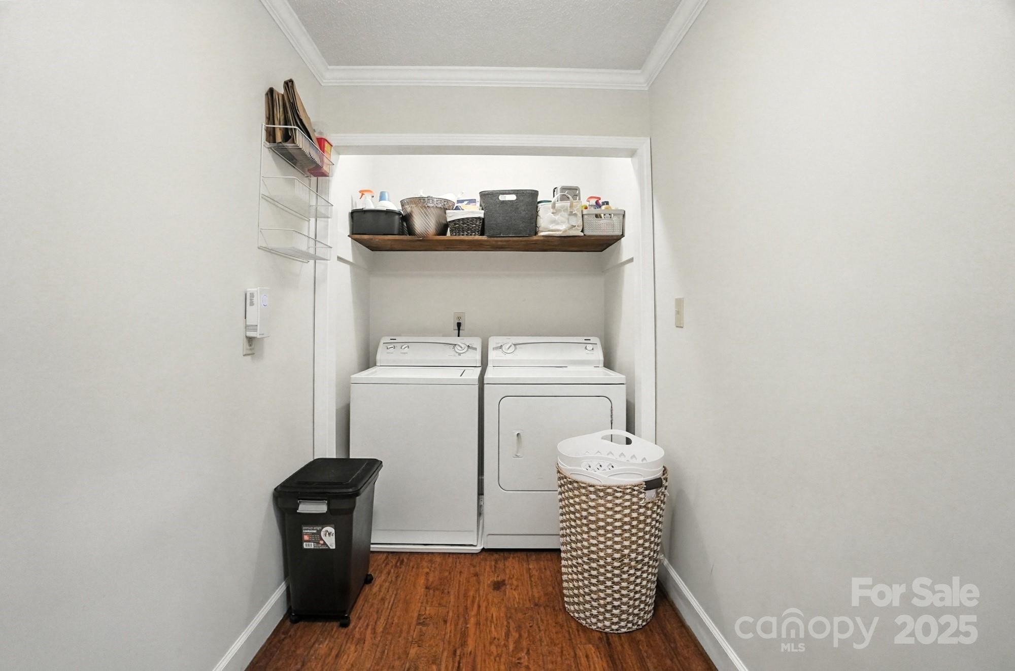 3618 Griffith Road Monroe, NC 28112 - Photo 22 of 48 a view of a hallway with washer and dryer