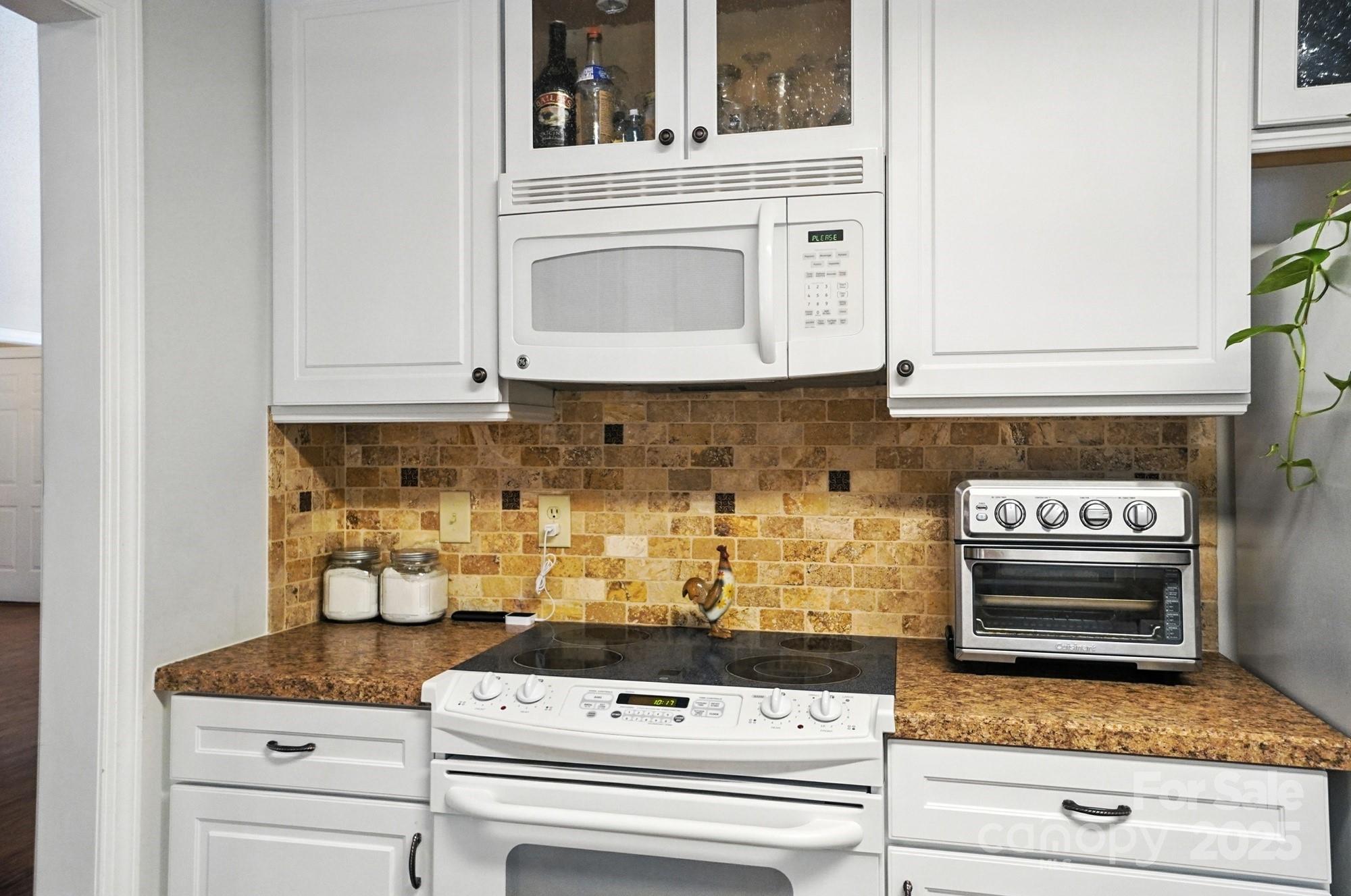 3618 Griffith Road Monroe, NC 28112 - Photo 23 of 48 a stove top oven sitting inside of a kitchen