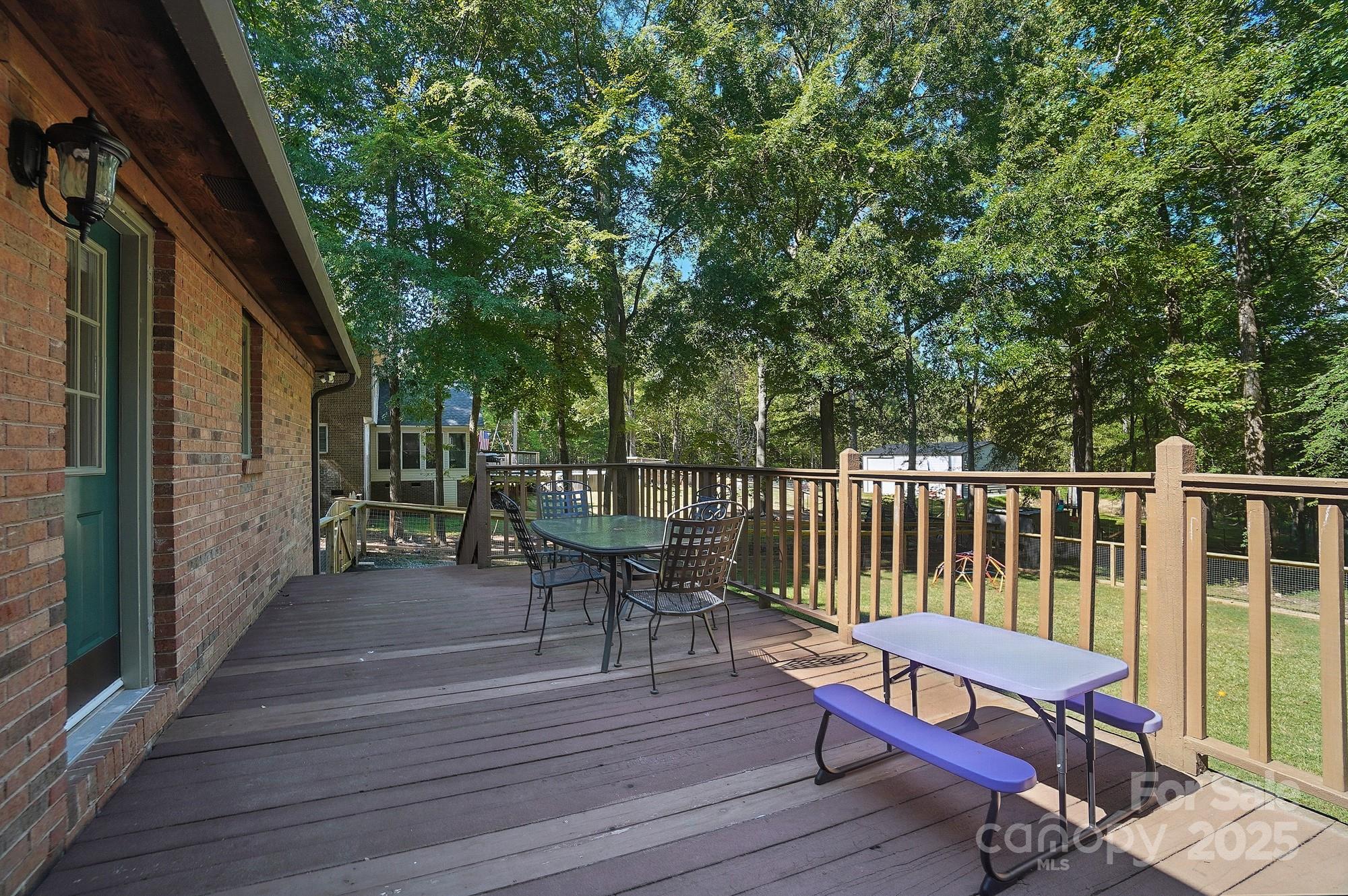 3618 Griffith Road Monroe, NC 28112 - Photo 38 of 48 a view of a chairs on deck
